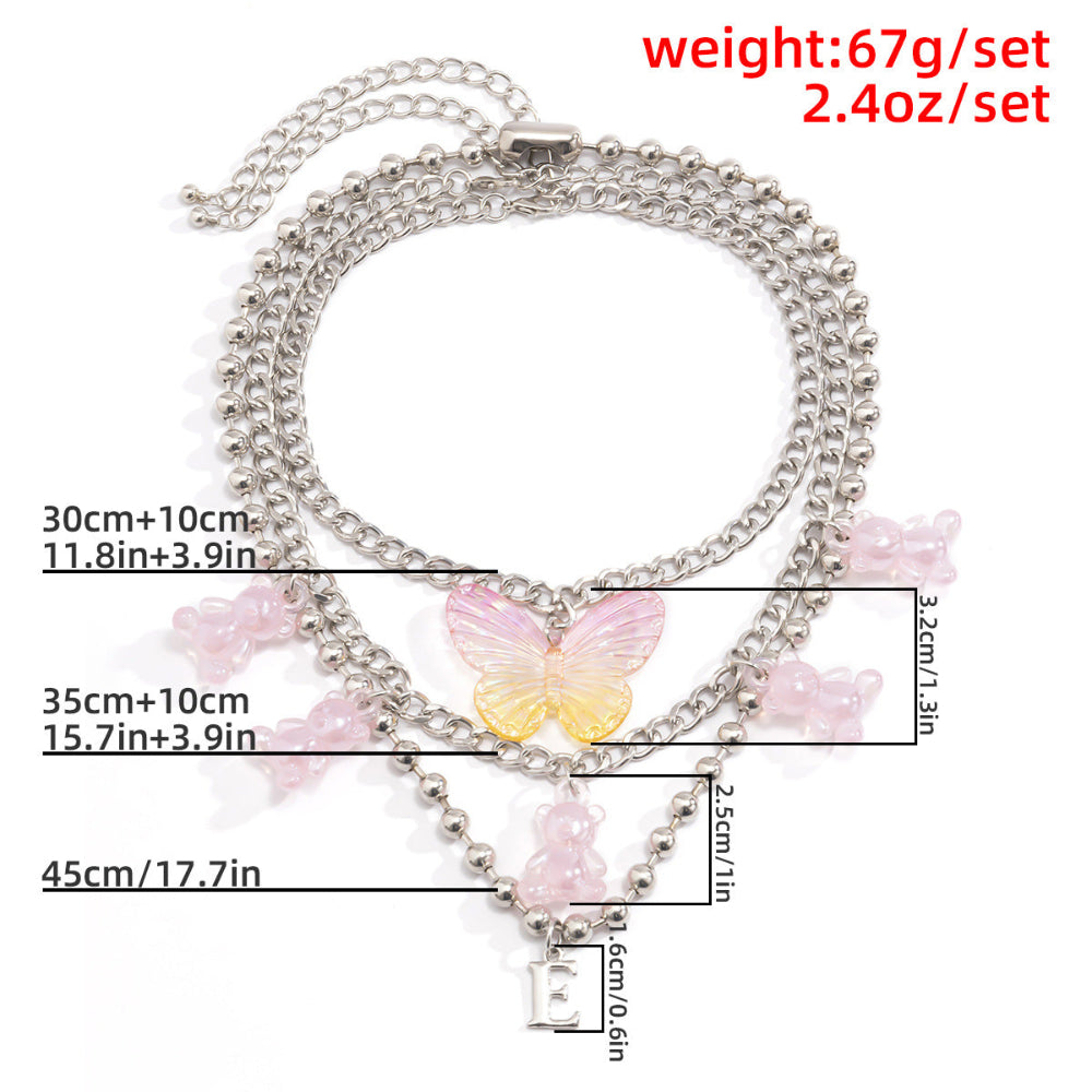 Silver butterfly pendant necklace with measurements – trendy layered chain jewelry with pink yellow butterfly charms, product specs photo.