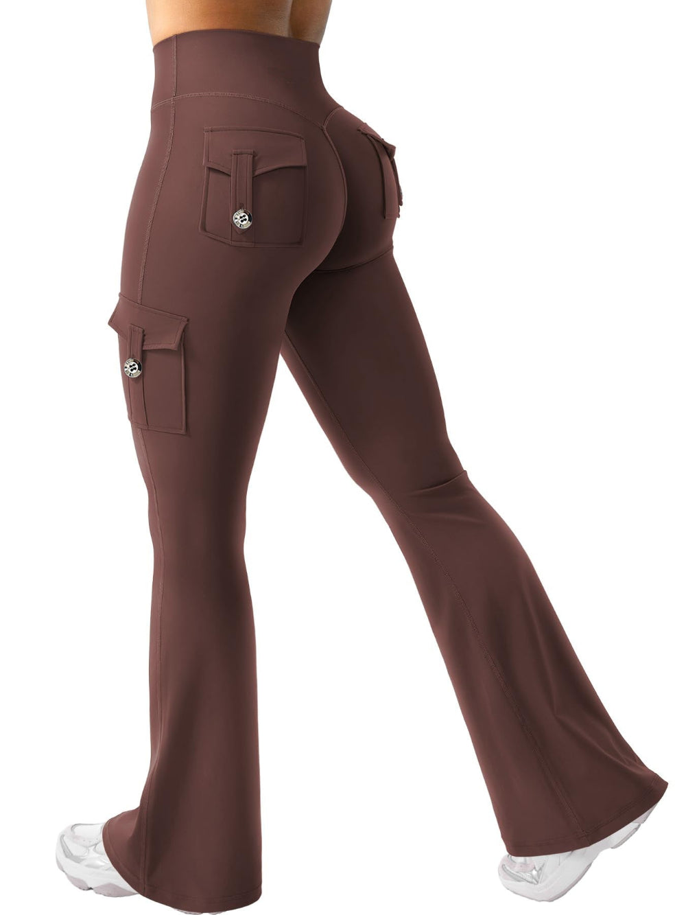 Woman modeling red high-waisted flared cargo pants with side and back pockets, shown from a rear three-quarter view against a clean white studio background.