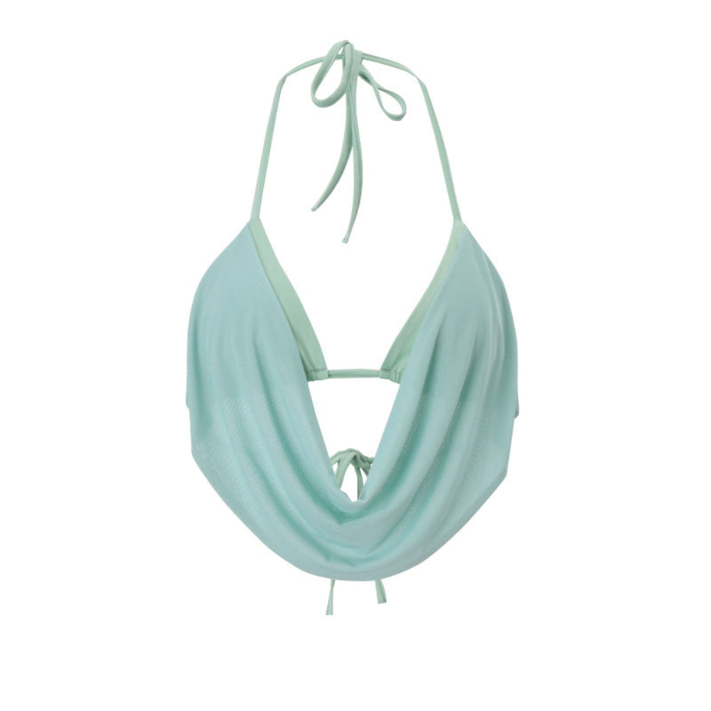 Light mint green halter crop top with draped cowl neckline, tie-back halter straps, and front tie detail.