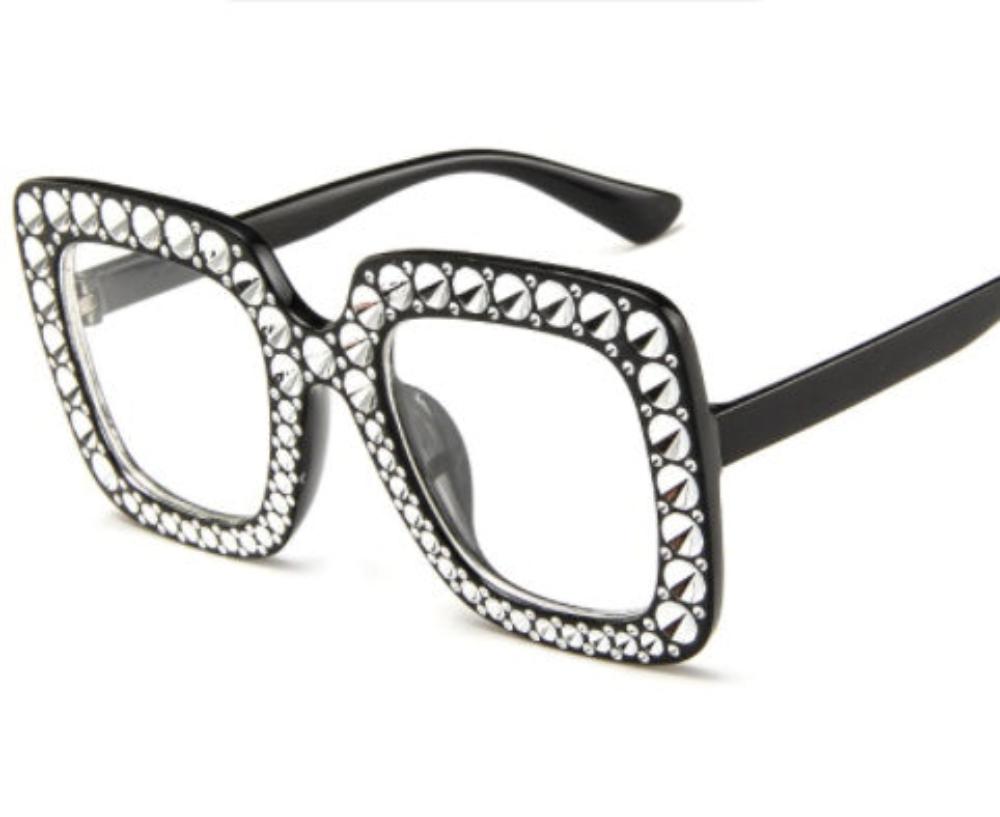 Black oversized square frames with clear lenses and crystal-studded rims, product photo on a white background.