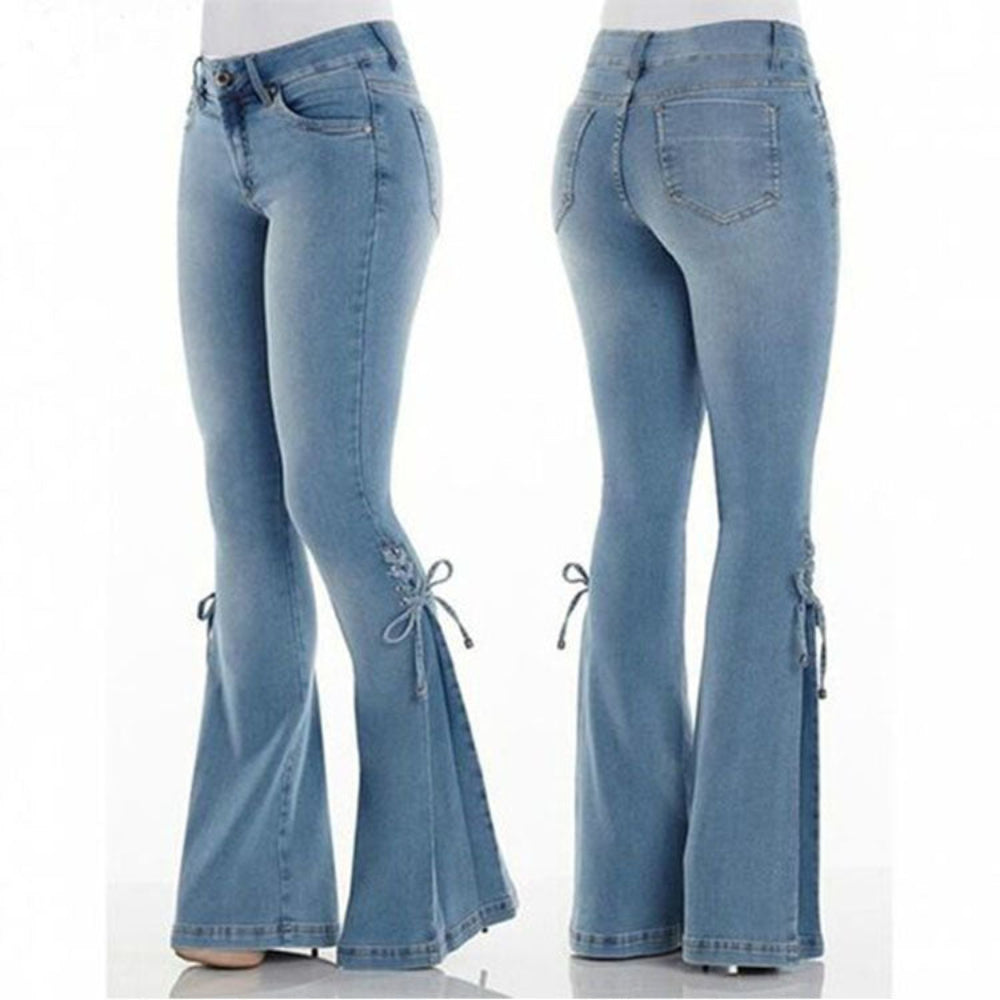 Front and back views of light blue flared jeans with side tie details at the flared hems, displayed on a mannequin. Stylish casual denim fashion product photography for Boutique Jolie.