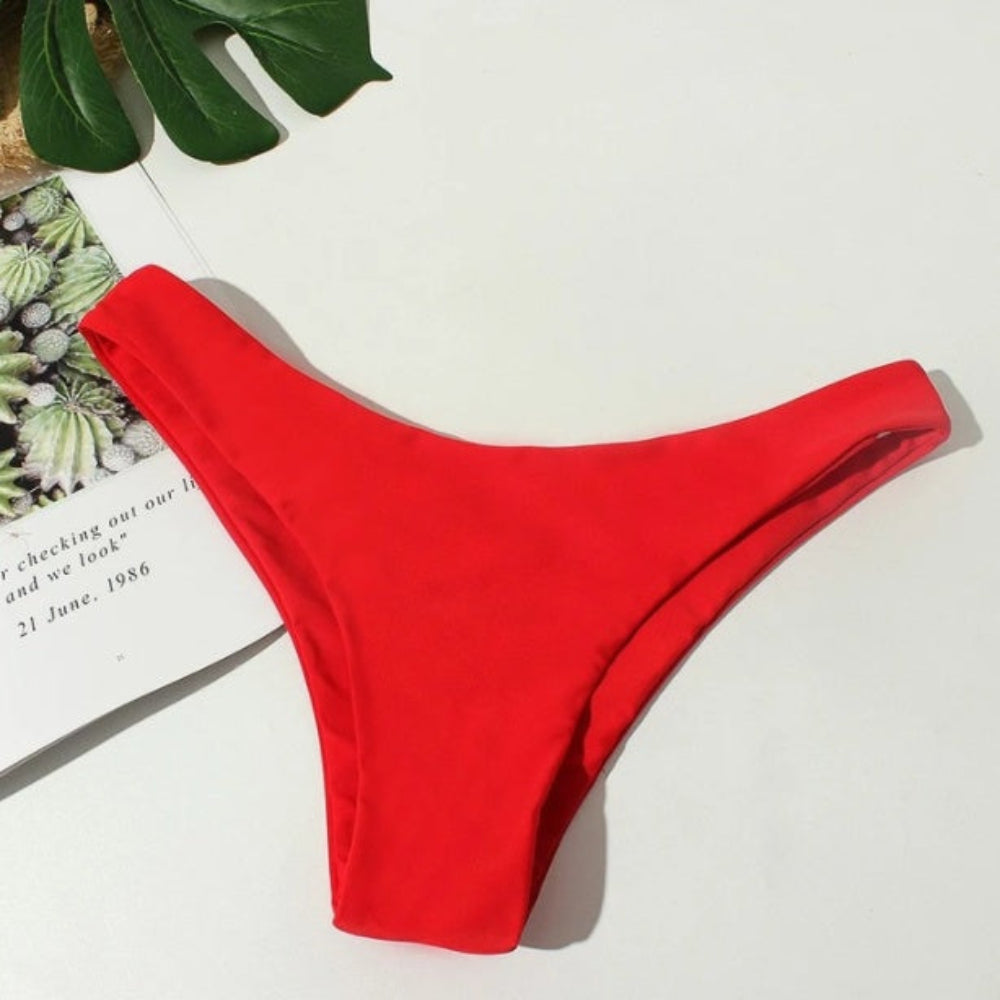 Red bikini bottom on a light background