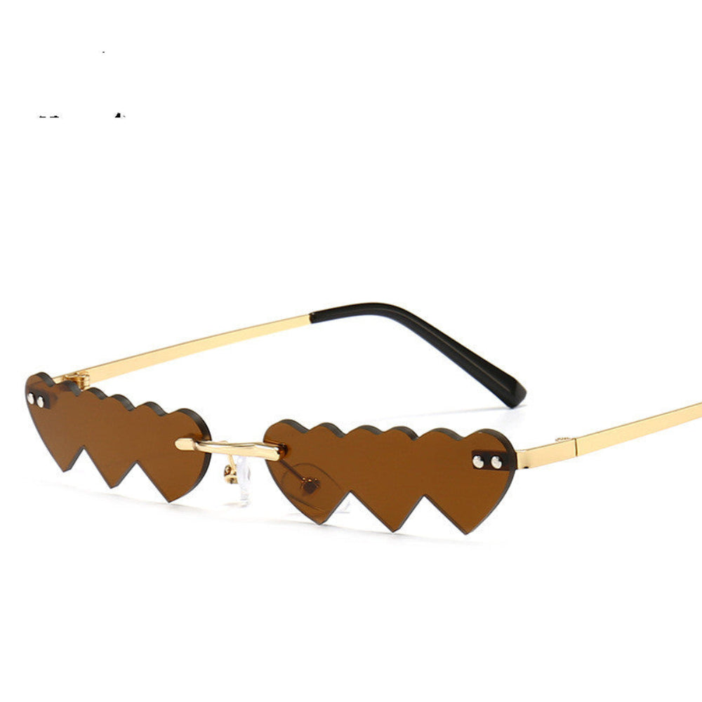 Rimless brown heart-shaped sunglasses with gold temples, product photo on a white background.