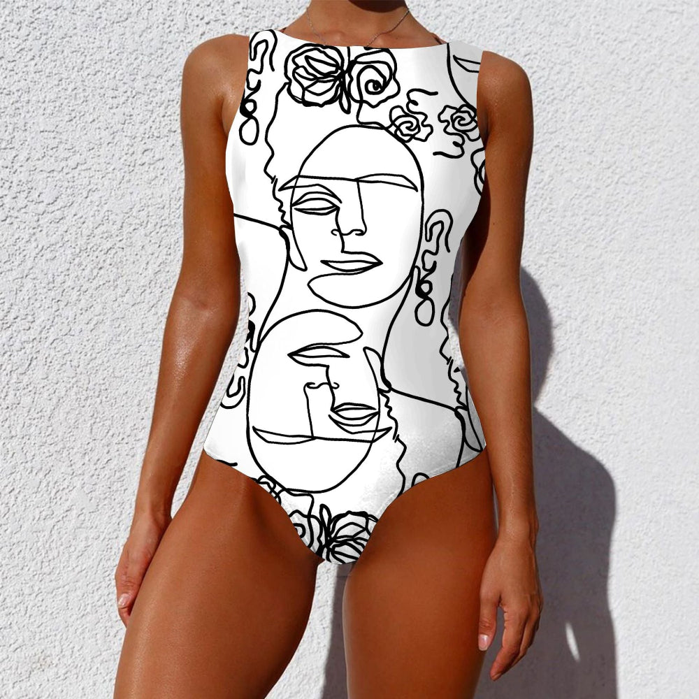 Person wearing a white swimsuit with black line art design against a white background