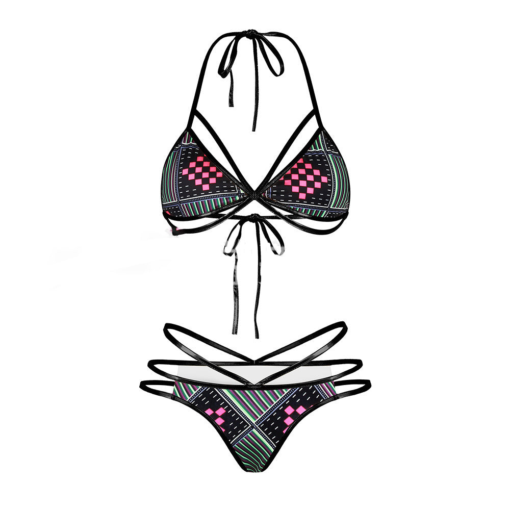 Black geometric pattern bikini set with triangle halter top and strappy bottom.