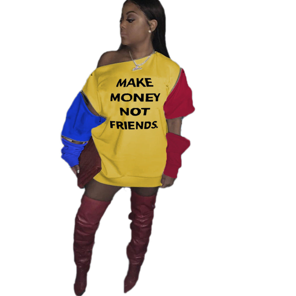 Woman wearing a yellow “Make Money Not Friends” color block sweatshirt dress with red and blue sleeves.