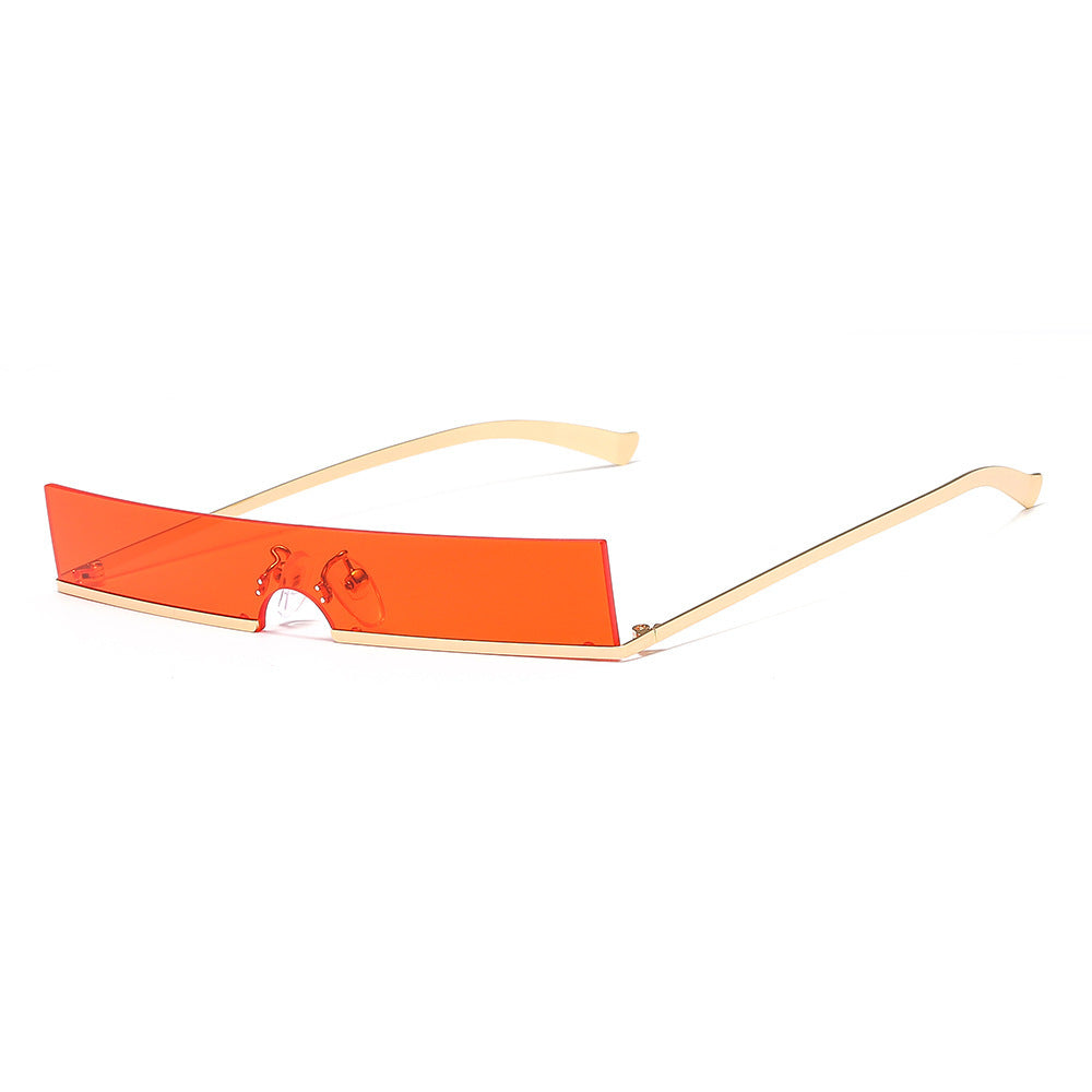 Rimless rectangular sunglasses with orange lenses and gold temples, product photo on a white background.