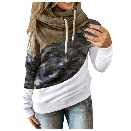 Color-block cowl-neck hoodie with olive, camo, and white panels, shown on a model.
