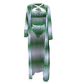 Green and white patterned dress on a white background