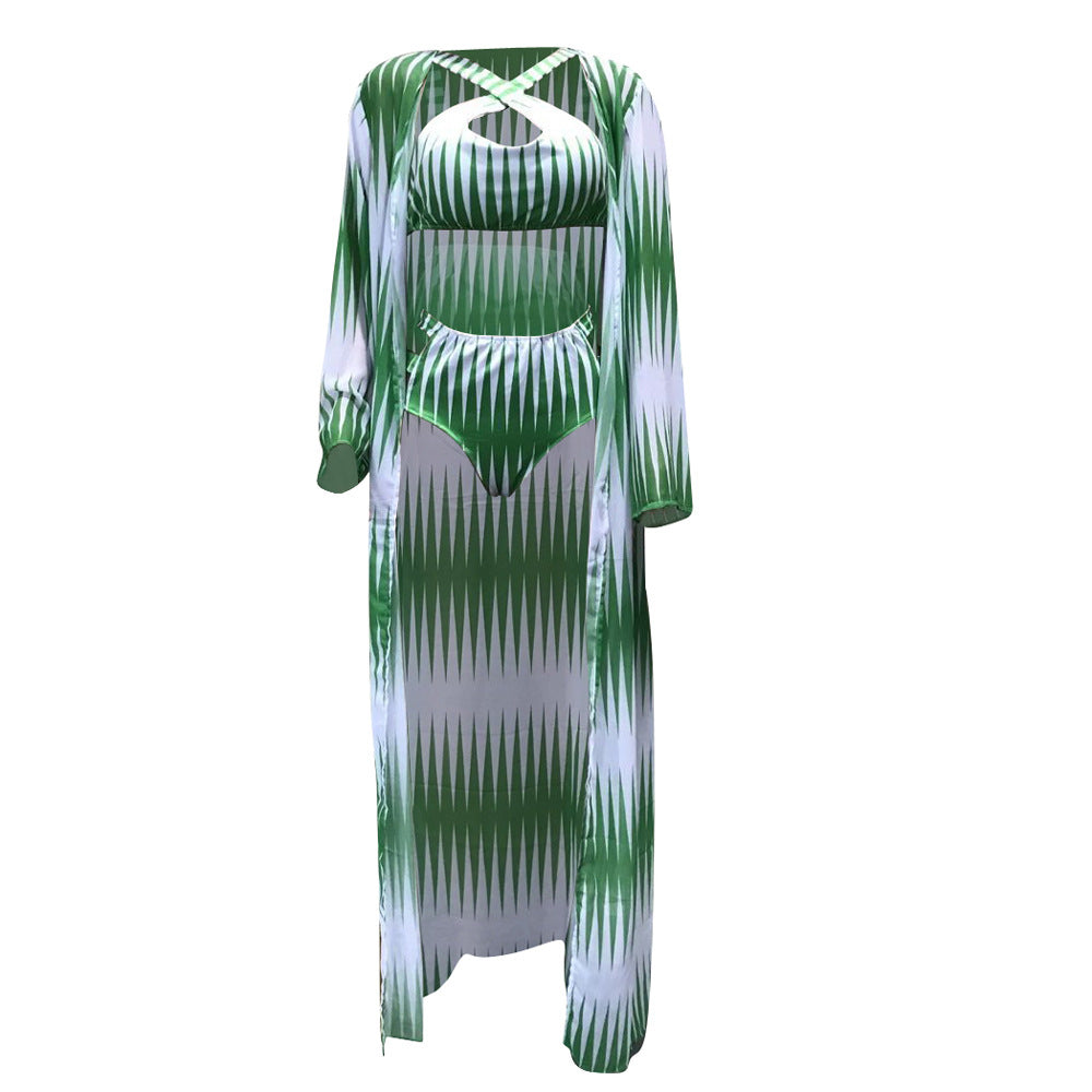 Green and white patterned dress on a white background