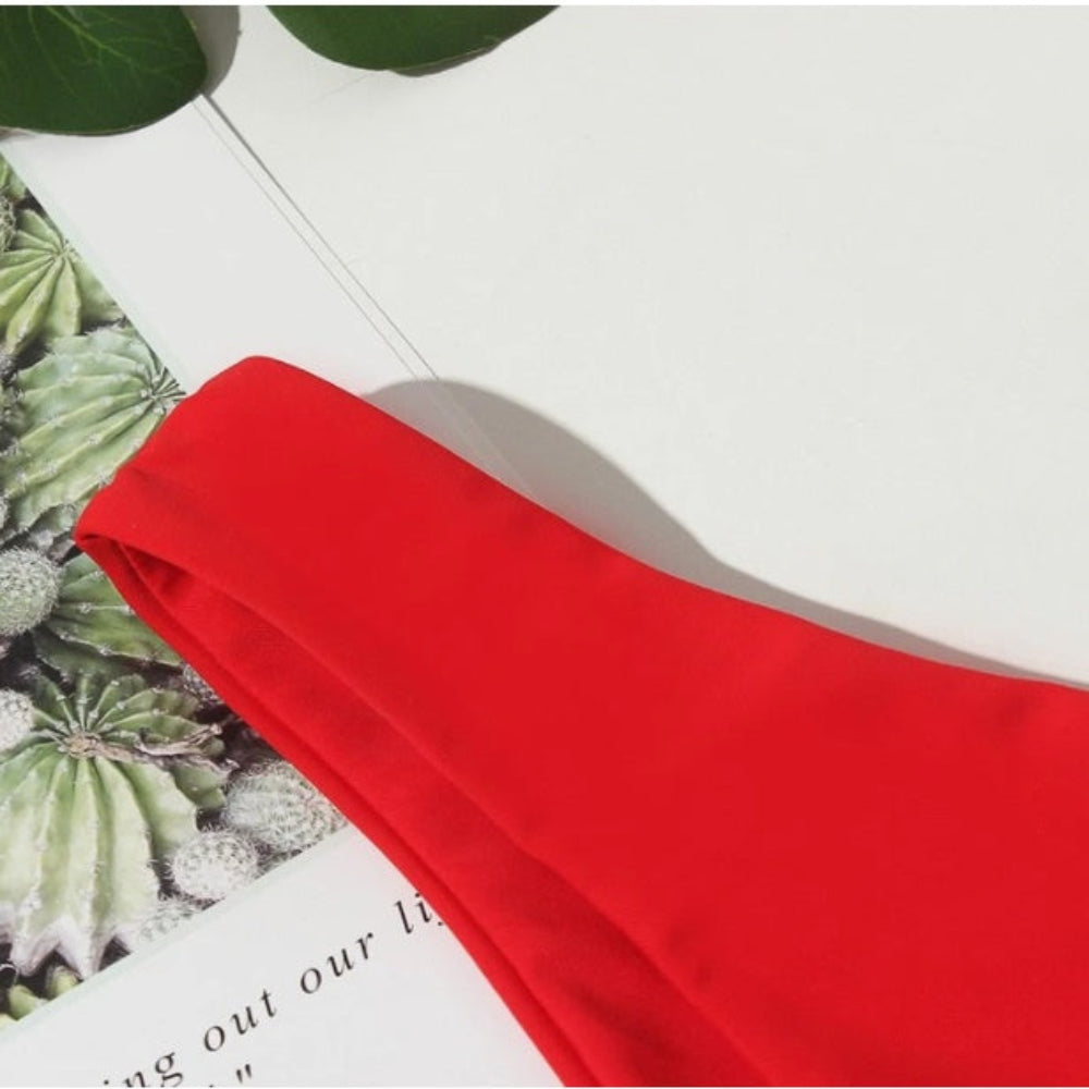Red fabric on a magazine with cactus illustration