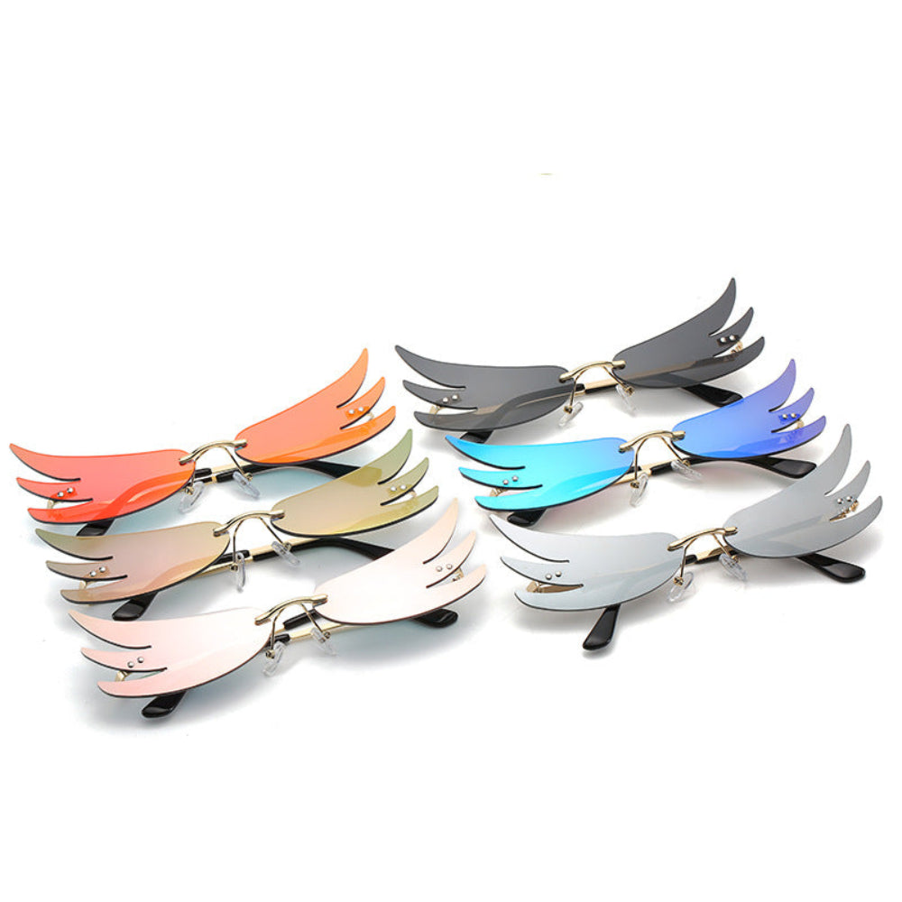 Assorted rimless wing-shaped sunglasses in orange, gold, peach, black, blue, and silver, product photo on a white background.