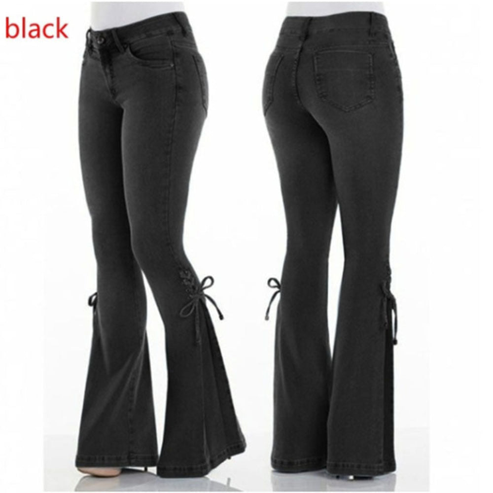Front and back views of black flared jeans with side tie details at the flared hems, displayed on a mannequin. Stylish casual denim fashion product photography for Boutique Jolie.