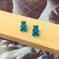 Bright blue translucent gummy bear stud earrings, cute jelly candy bear design with earring posts