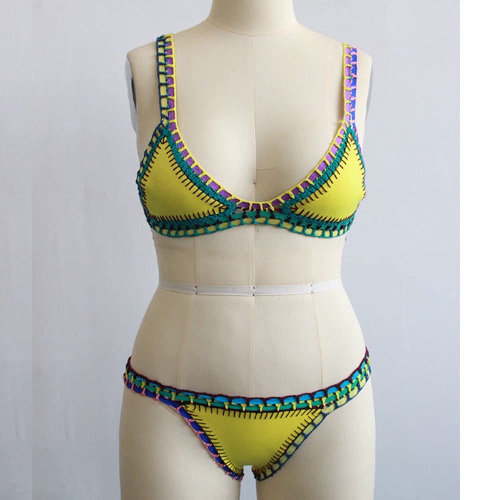 Yellow bikini set with colorful contrast stitch trim on triangle top and bottom on mannequin.