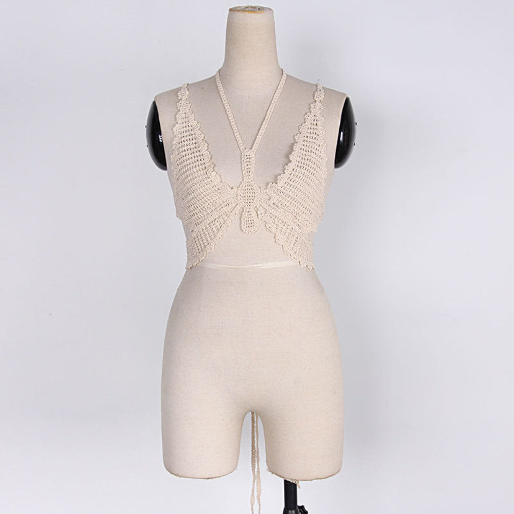 Beige crochet halter bikini top on mannequin.
