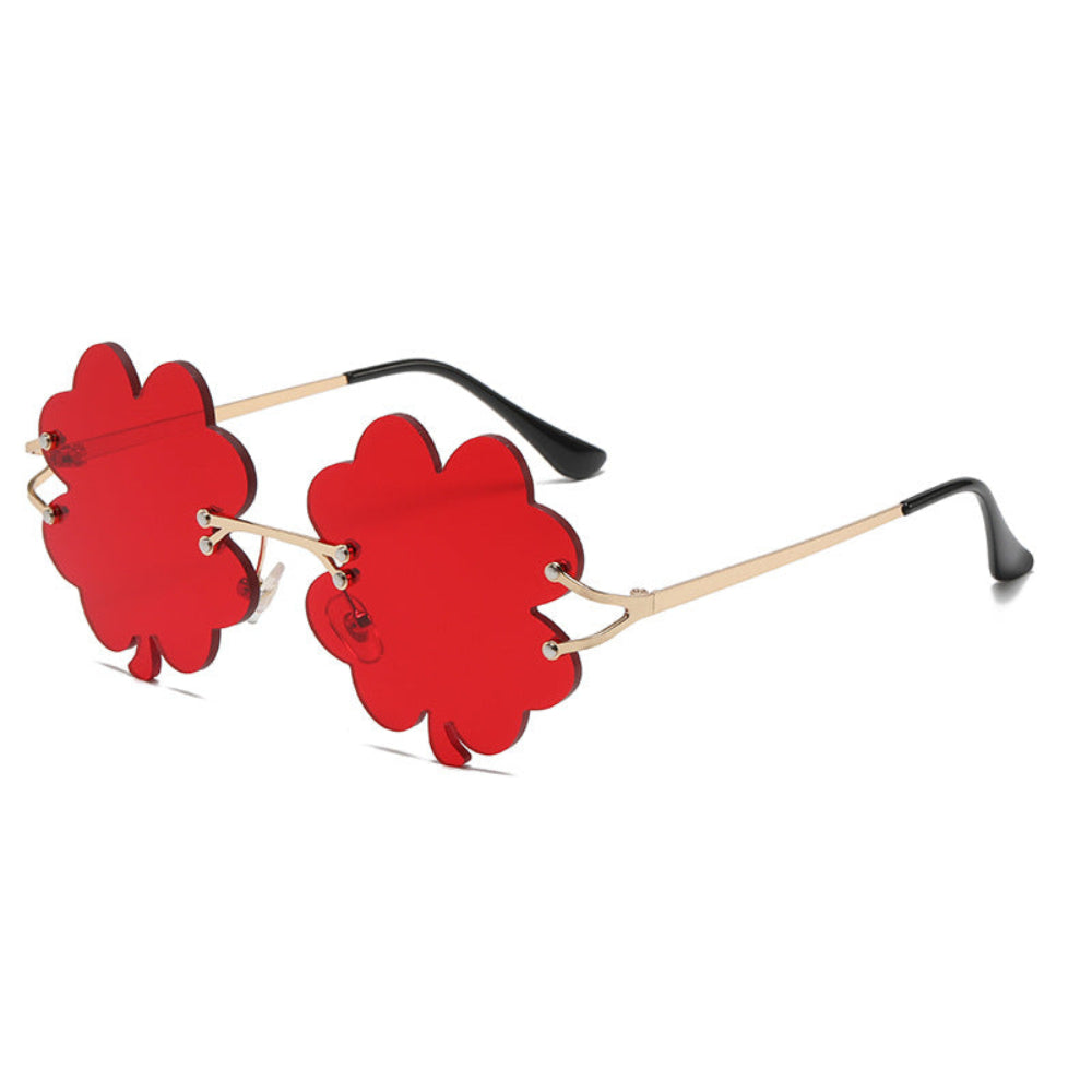 Rimless red shamrock sunglasses with gold temples, product photo on a white background.
