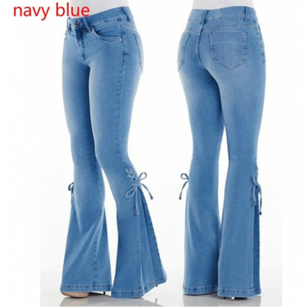 Front and back views of navy blue flared jeans with side tie details at the flared hems, displayed on a mannequin. Stylish casual denim fashion product photography for Boutique Jolie.