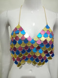 Multicolor sequin scale-pattern halter crop top in pink, blue, yellow and gold, displayed on a mannequin.