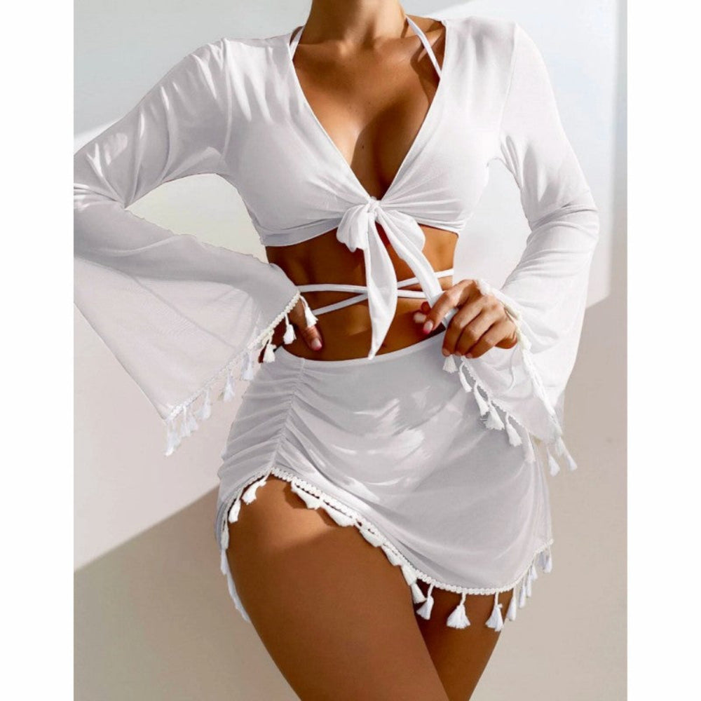 White long sleeve tie-front crop top and ruched tassel mini skirt matching beach set.