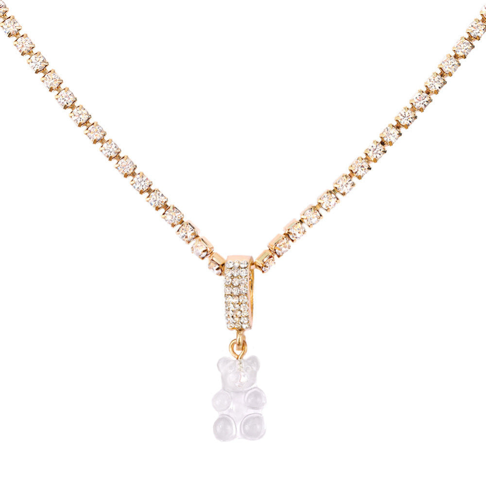 Sparkling silver tennis chain necklace featuring a fully pavé-style band and a bright white translucent gummy bear pendant hanging from the center. Clean product photography on a plain white background.