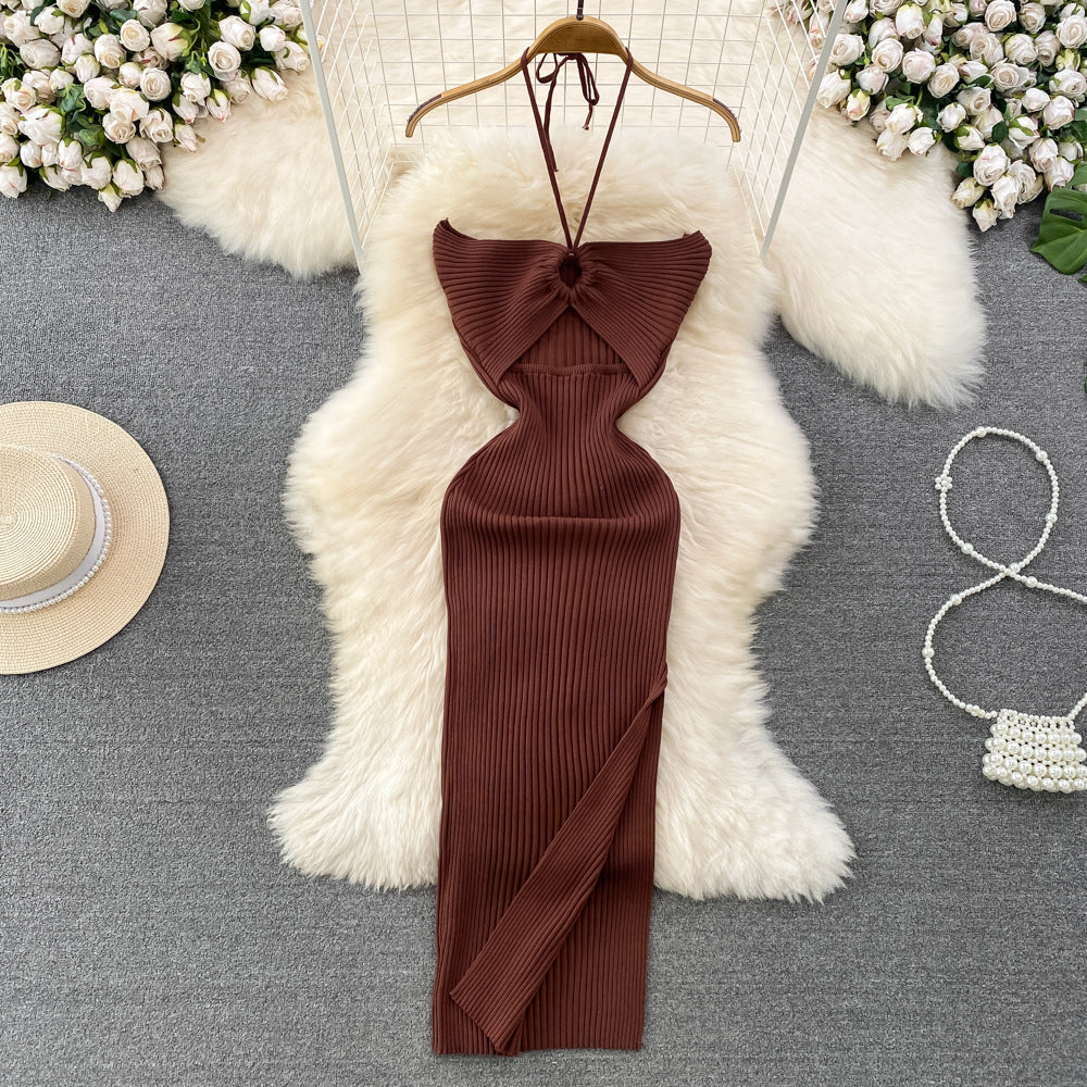 Brown ribbed knit halter maxi dress with front keyhole cutout on wooden hanger.