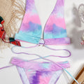 Pastel tie-dye bikini set in pink purple blue with glitter sparkle triangle top and tie-side bottom.