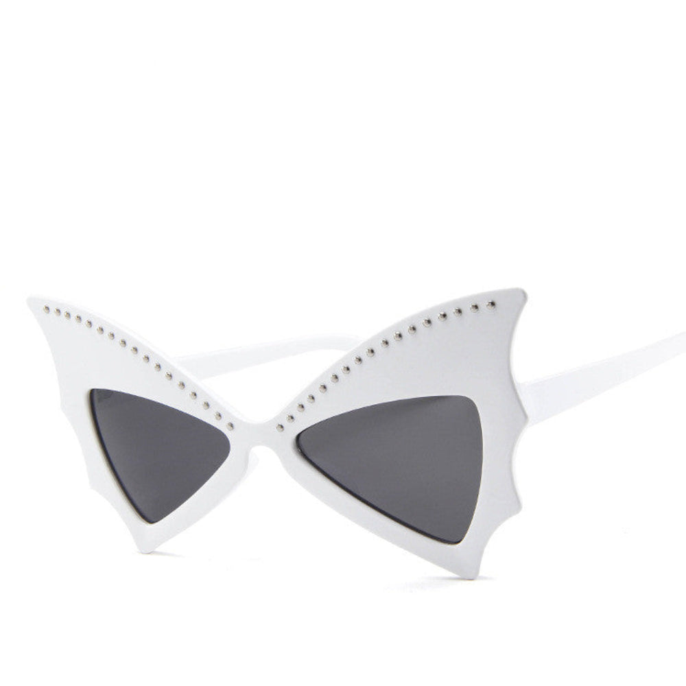 White batwing sunglasses with rhinestone brow line and dark lenses, product photo on a white background.