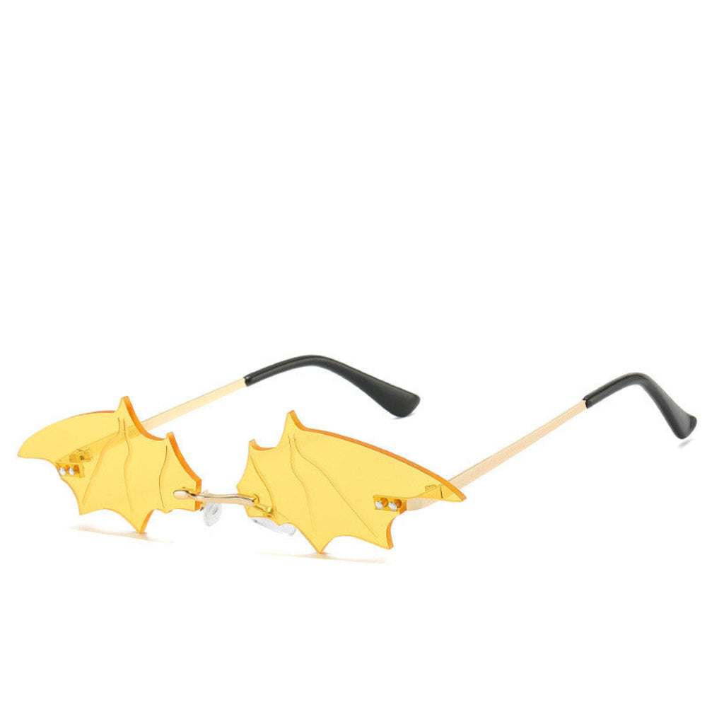 Rimless yellow bat-wing sunglasses with gold temples, product photo on a white background.
