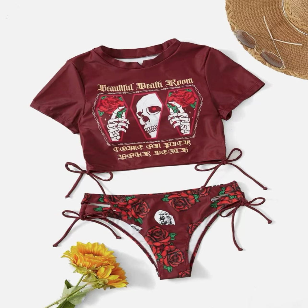 Burgundy crop top and bikini bottom set with graphic design on a white background