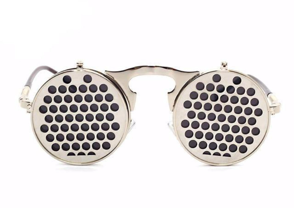 Silver flip-up steampunk sunglasses with perforated dot covers over dark lenses, front product photo on a white background.