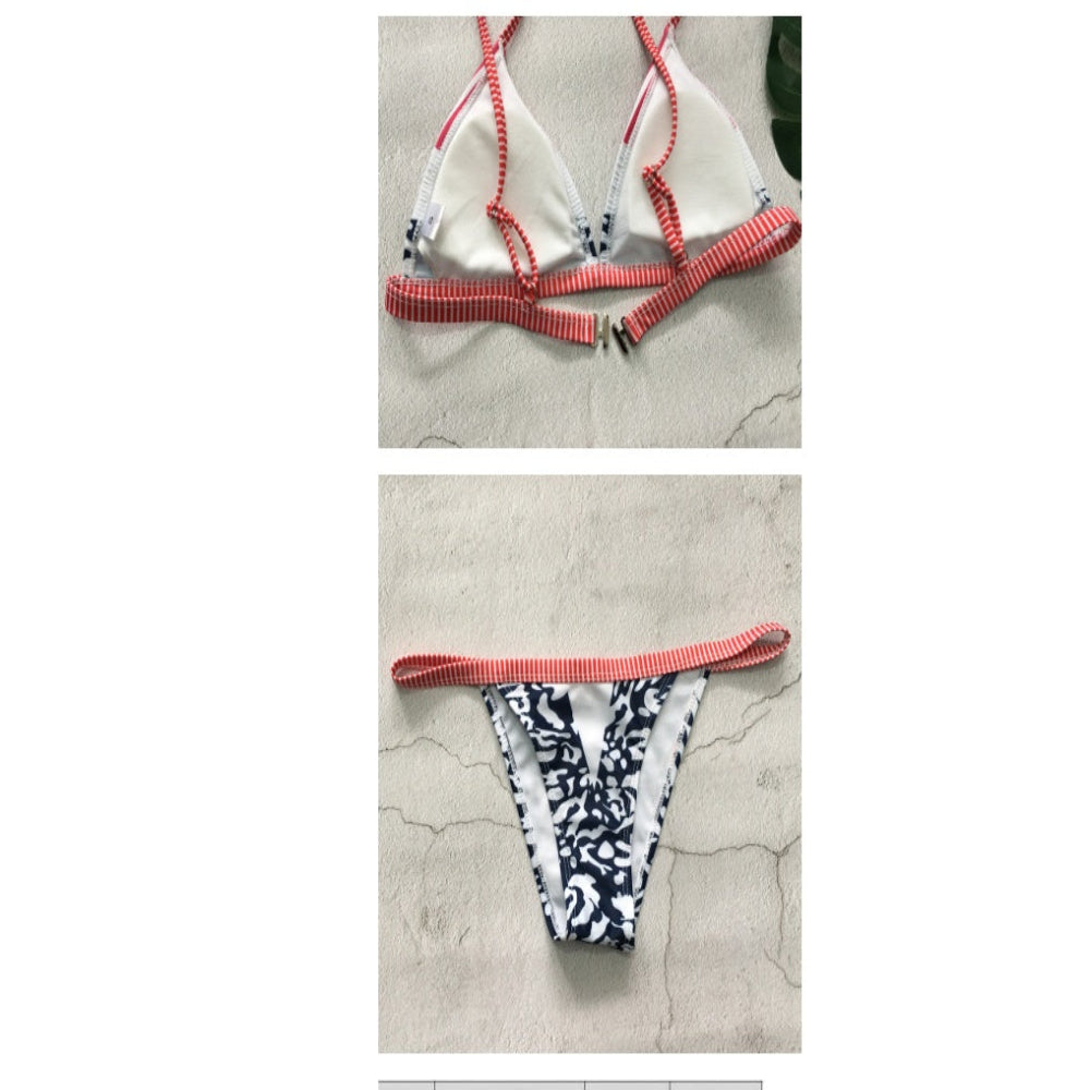 Bikini set with red and white striped straps on a textured surface
