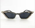 Black cat-eye sunglasses with dark lenses and crystal rhinestone trim, product photo on a white background.