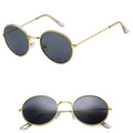 Stylish gold metal round sunglasses featuring dark smoke/black tinted lenses, shown from multiple angles