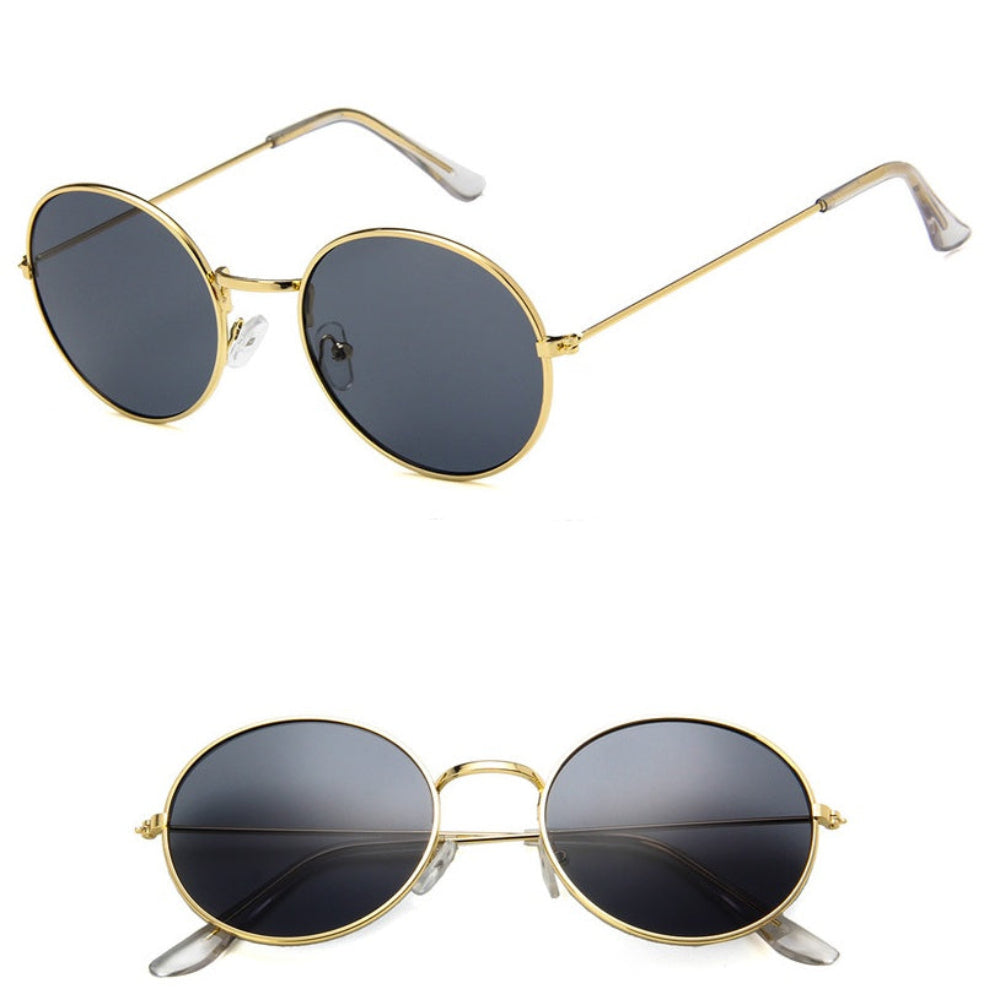 Stylish gold metal round sunglasses featuring dark smoke/black tinted lenses, shown from multiple angles