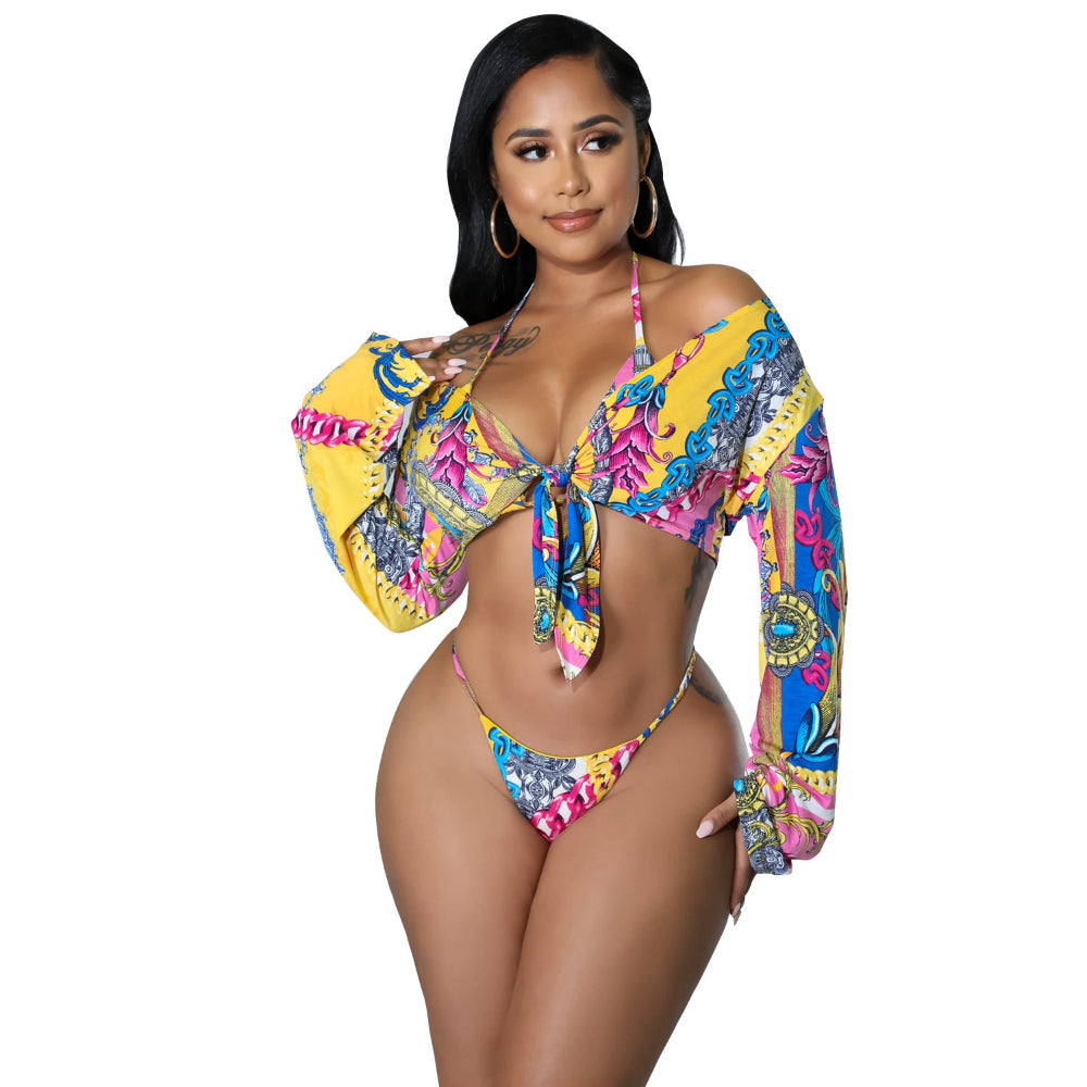 Woman wearing a colorful patterned swimsuit on a white background