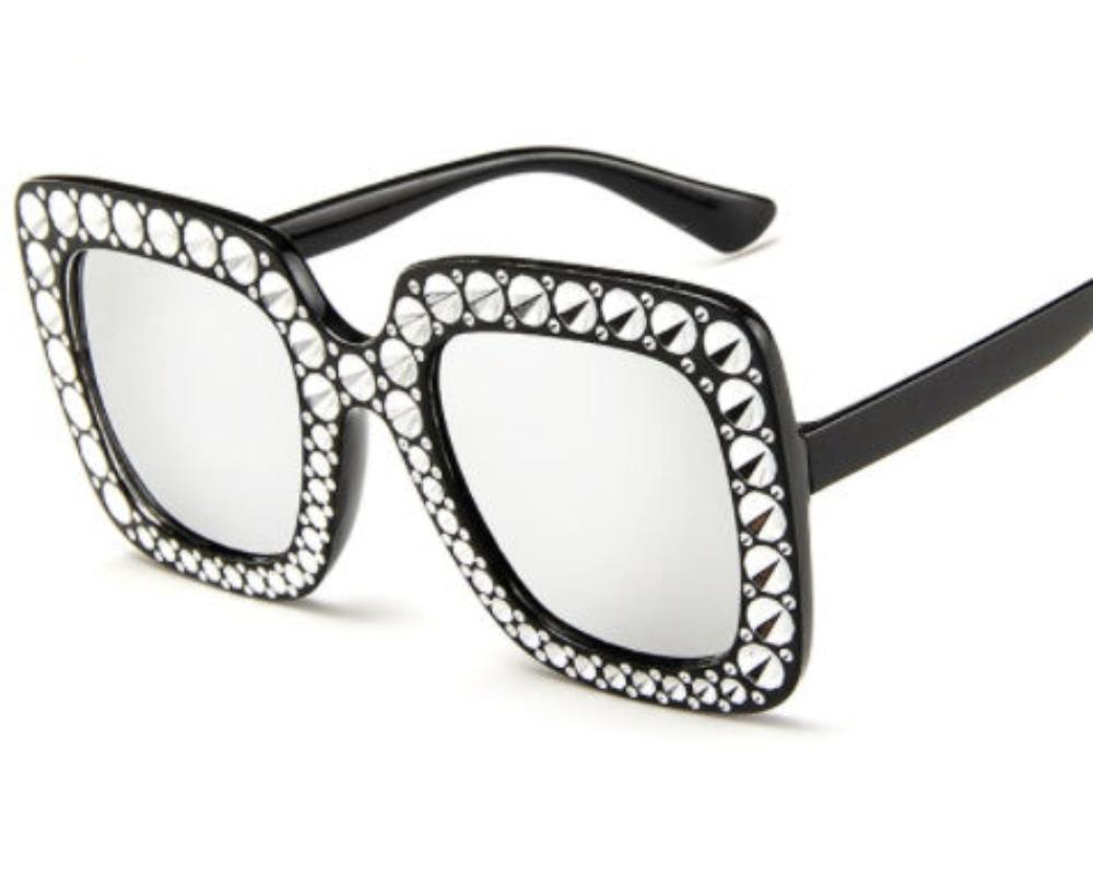 Black oversized square sunglasses with silver mirror lenses and crystal-studded frames, product photo on a white background.