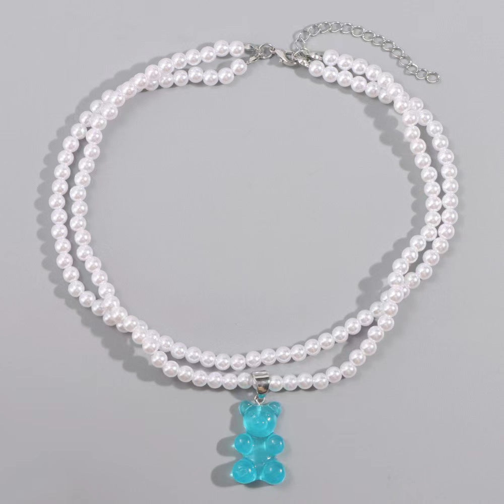 blue teddy bear pearl layered necklace set – trendy chunky  silver pearl statement jewelry with grey background