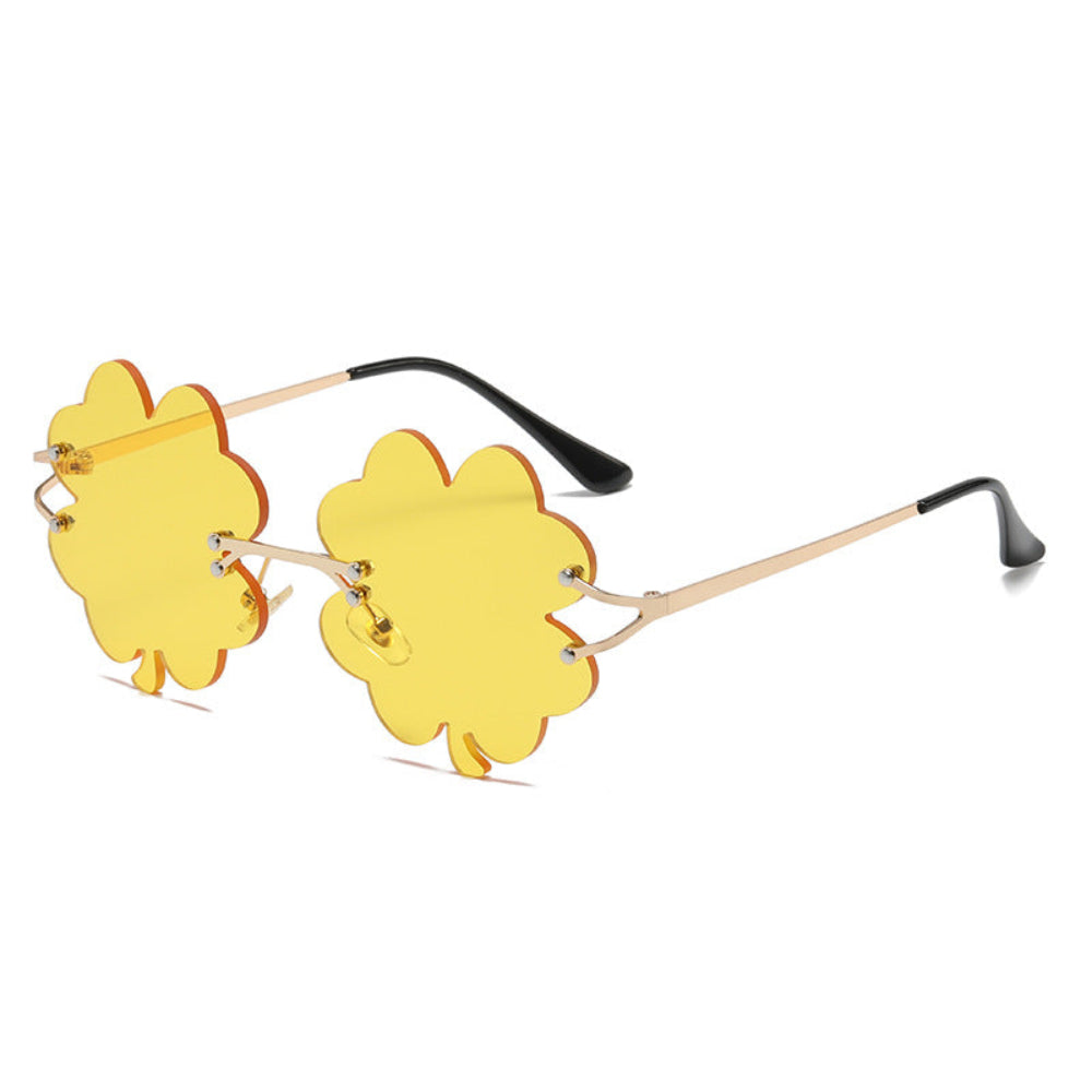 Rimless yellow shamrock sunglasses with gold temples, product photo on a white background.