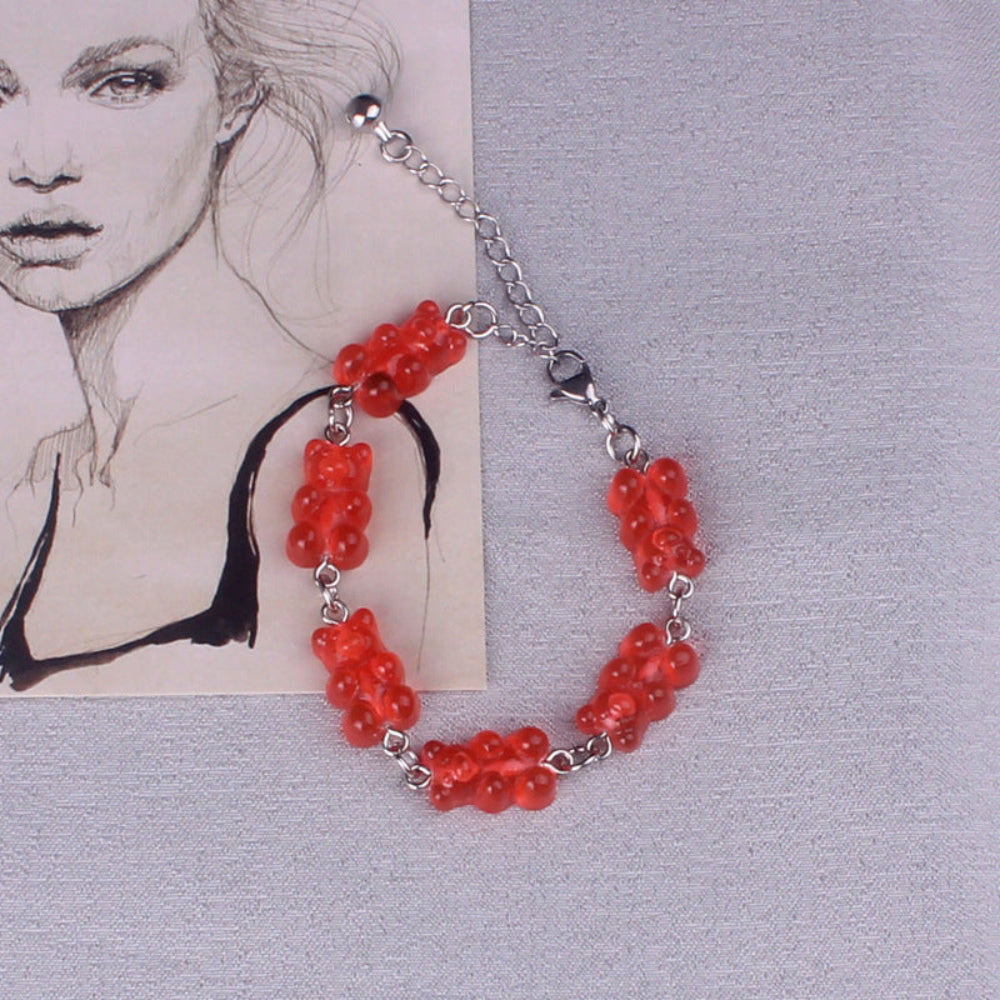Red translucent gummy bear beaded bracelet with silver tone chain links and lobster clasp