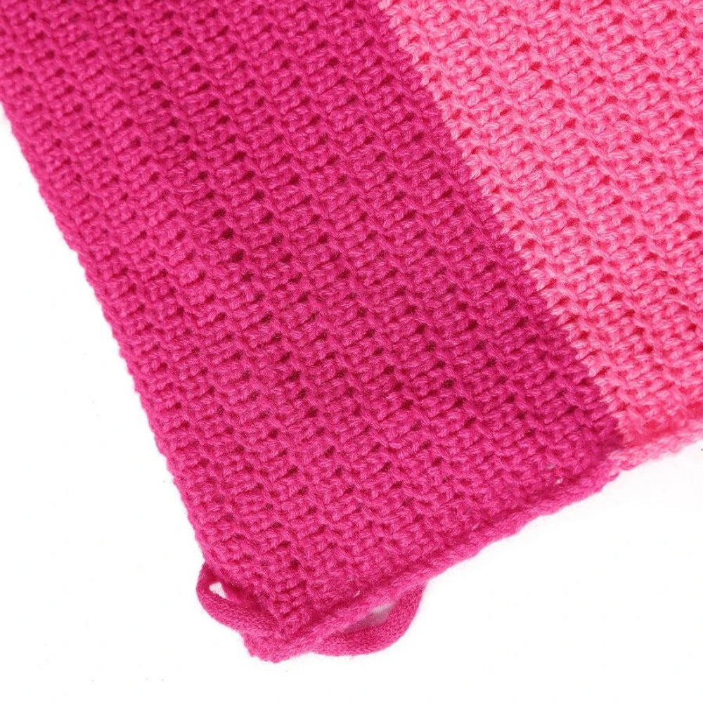 Close-up detail of vibrant pink and light pink ribbed knit fabric with drawstring.