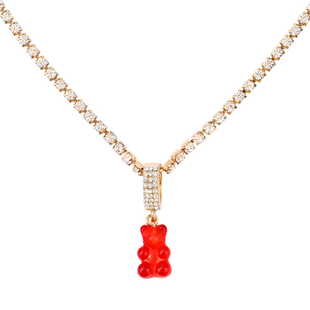 Tennis chain necklace with red gummy bear pendant – trendy silver bling chain with fun bear charm, statement jewelry.
