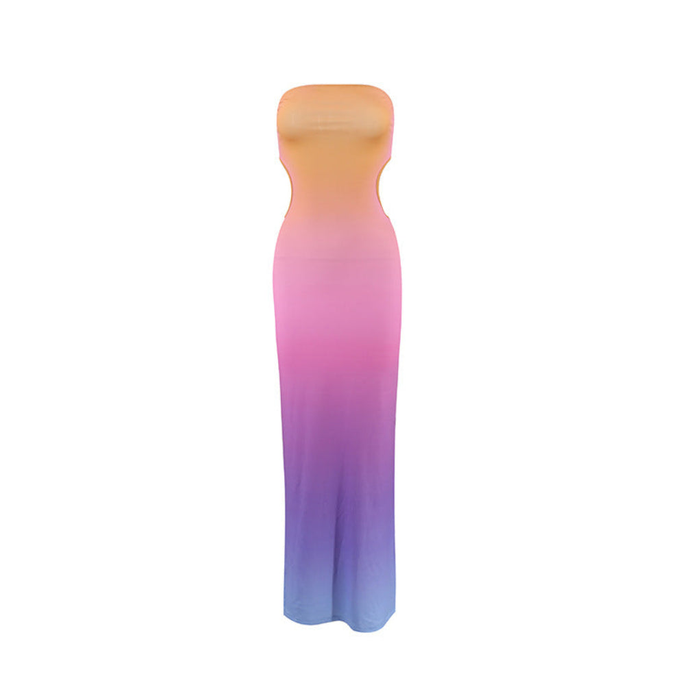 Sleek strapless floor-length dress featuring a smooth ombre gradient from warm orange at the bust through pink to cool blue and purple at the hem. Full product view highlighting the figure-skimming silhouette and vibrant color transition on a plain white background.