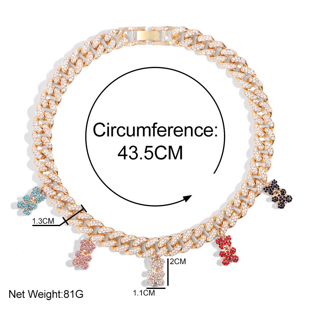 Luxury gold Cuban link chain necklace fully iced with sparkling cubic zirconia stones. Features multiple colorful teddy bear charms in light blue, pink, black, and red, plus a larger teddy bear pendant. Shown with measurements: 43.5cm circumference, net weight 81g. 