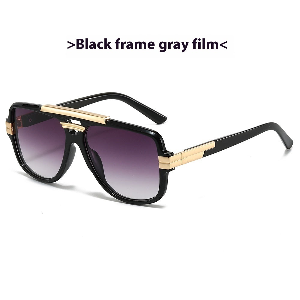 Black square retro sunglasses with gold brow bar and gray-purple gradient lenses, product photo on a white background.