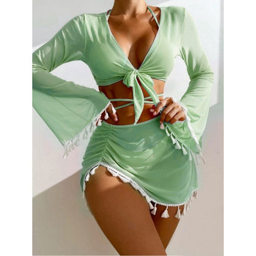 Mint green long sleeve tie-front crop top and ruched tassel mini skirt matching beach set.