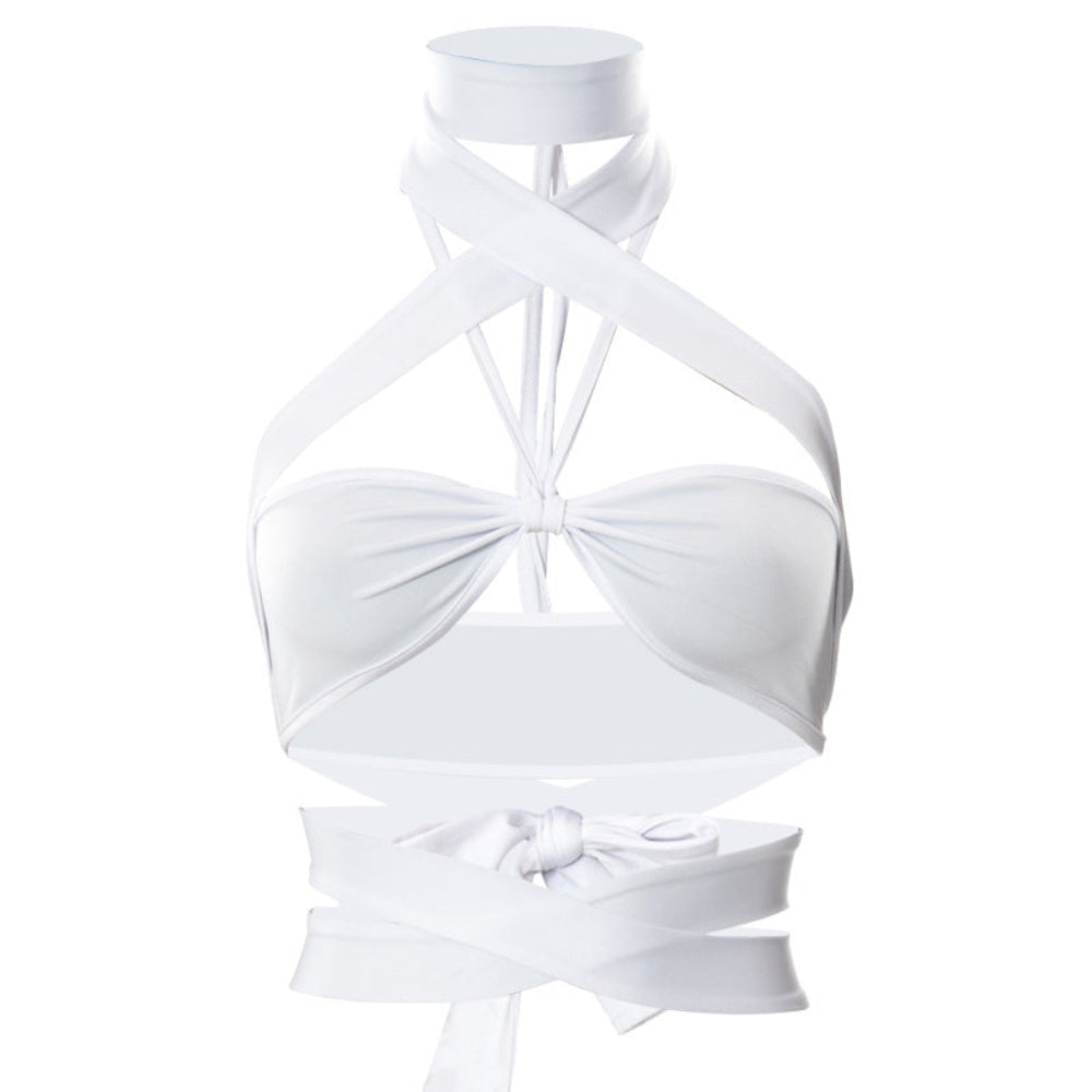 Front view of the white halter crop top displayed on a mannequin neck form, featuring a halter neck with adjustable crisscross straps, a gathered twist detail at the bust, and long wrap ties at the hem that can be styled and tied into a bow.