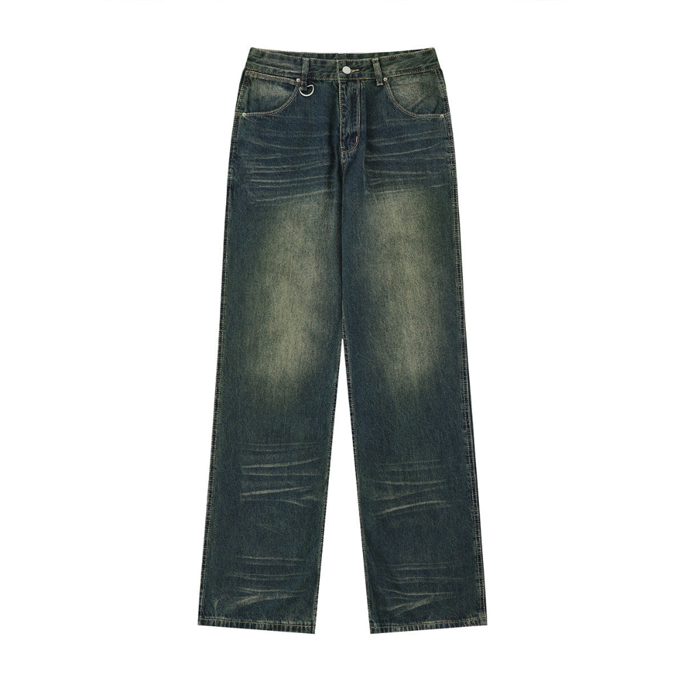Dark blue wide-leg distressed jeans with faded wash, subtle whiskering, and raw hem details, laid flat on a white background. Casual unisex-style denim product photography for Boutique Jolie.