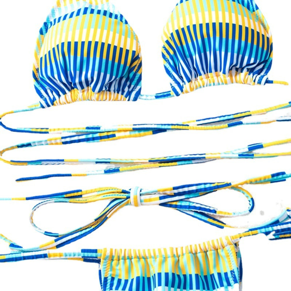 Blue and yellow striped bikini set with matching headband on a white background