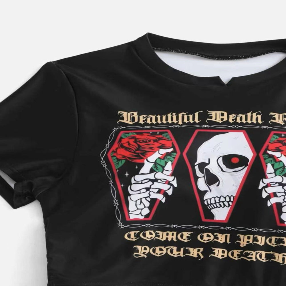 Black t-shirt with graphic design featuring a skeleton, roses, and text on a white background